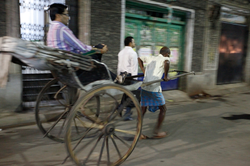 India - Calcutta - In theory those hand cars are forbidden. It doesn't bother much our businessman